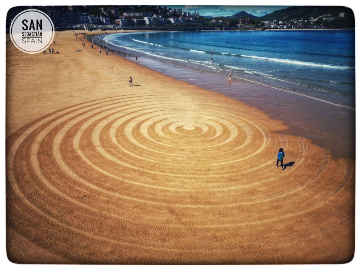 Rake Artist on the Beach