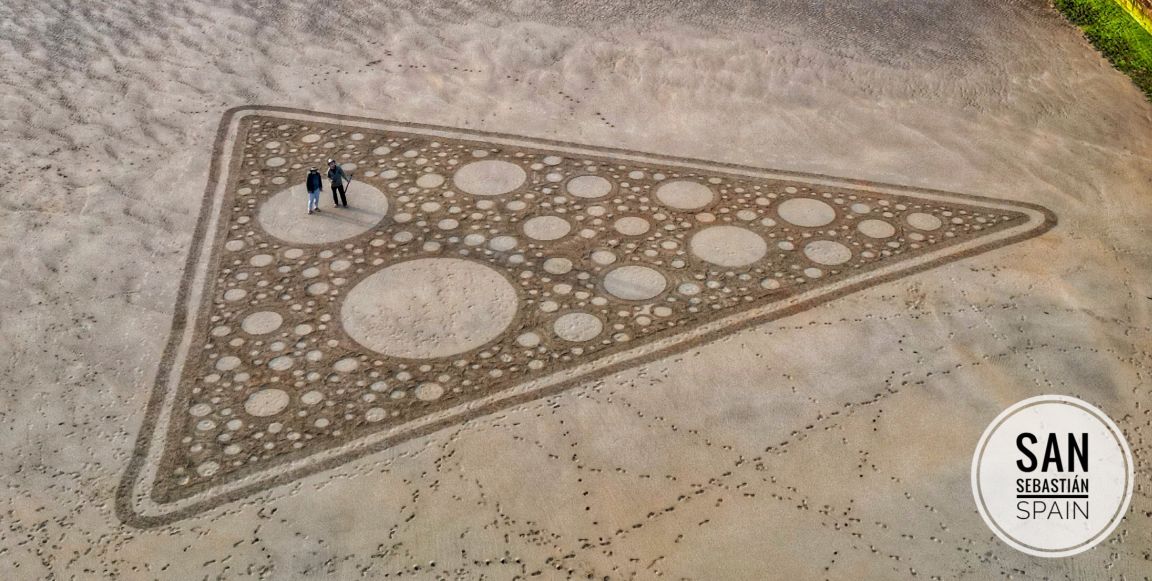 Rake Artist on the Beach